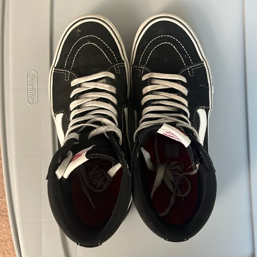 Black and white Vans Hi Tops. Size 10